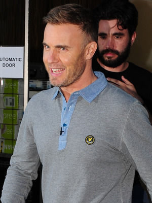 Gary Barlow leaving his hotel for the first day of boot camp
Liverpool, England - 17.07.12
Mandatory Credit: WENN.com