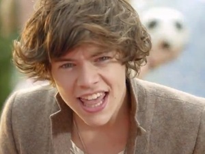 Harry Styles in the One Direction Live While We're Young video