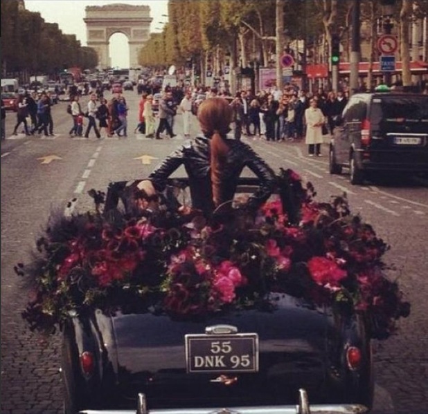 Lady Gaga driving to her perfume launch in Paris on Sunday, 23 September.
