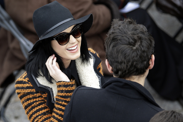 John Mayer and Katy Perry arrives for the ceremonial swearing-in of President Barack Obama at the U.S. Capitol during the 57th Presidential Inauguration in Washington, Monday, Jan. 21, 2013. (AP Photo/Carolyn Kaster)