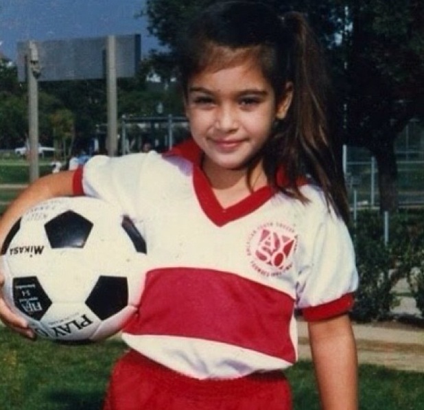 http://i3.cdnds.net/13/05/618x597/kim-kardashian-child-football.jpg