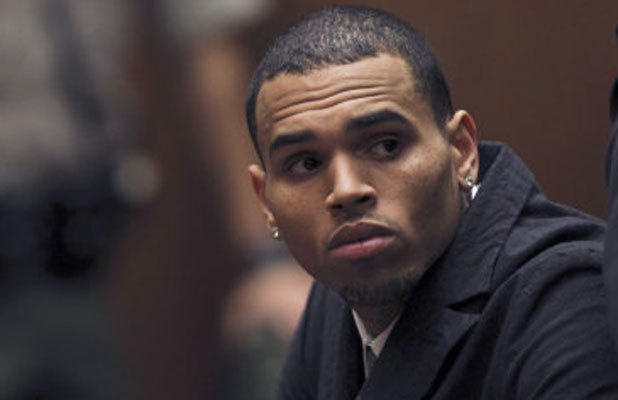 Chris Brown at court on 6 February with his lawyer
