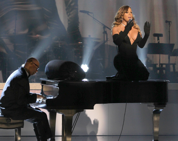 Mariah Carey Wows In Plunging Black Dress On Top Of Piano At Bet Honors Celebrity News News 
