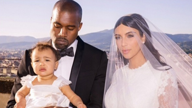 Kim Kardashian and Kanye West with daughter North on their wedding day in Florence, Italy on 24 May. Image released 11 June.