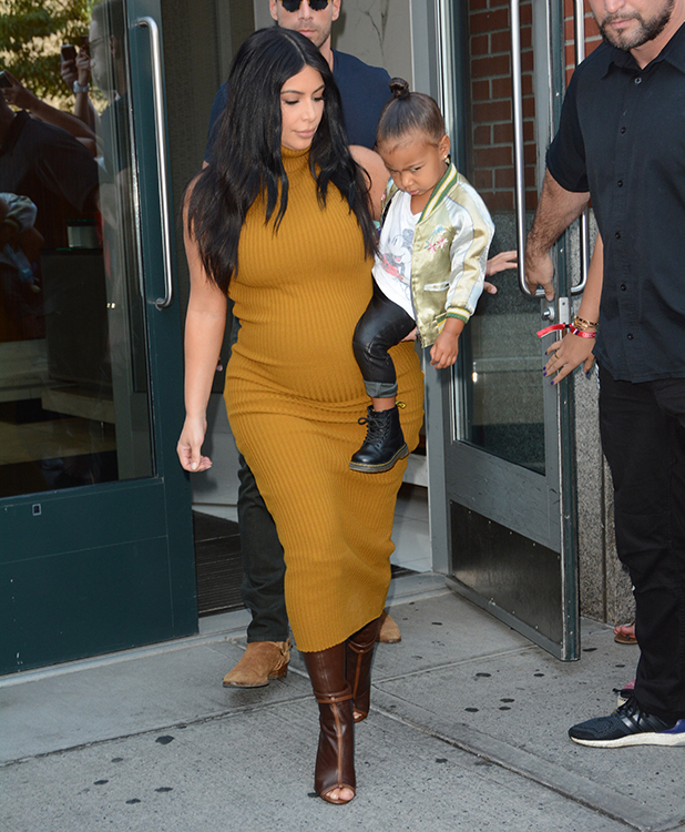 Pregnant Kim Kardashian Carries Fashionista North In New York Celebrity News News Reveal