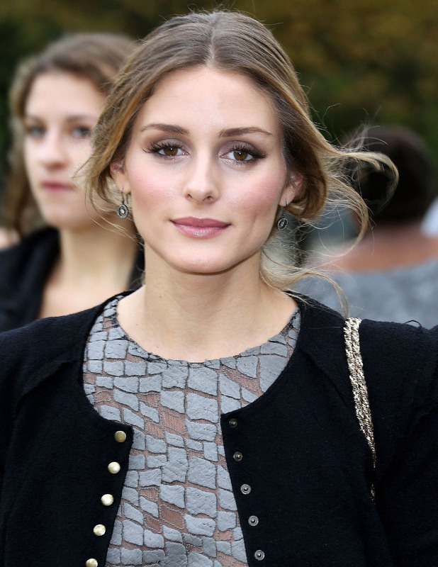 Olivia Palermo wears leather skinnies and camo heels to Paris Fashion ...
